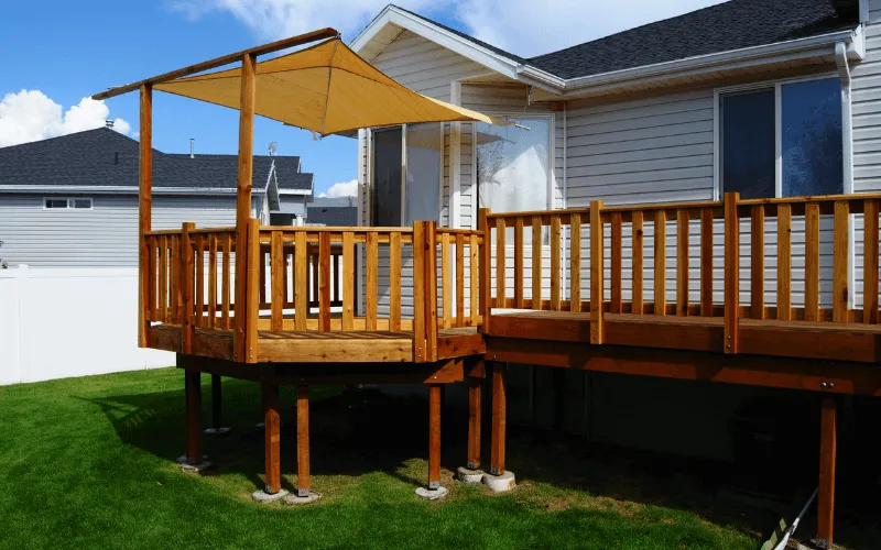 house-level-wood-deck-above-grass-backyard_result